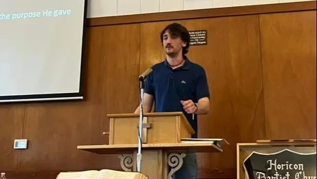 Former intern Edward Rodier preaching