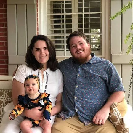 Pastor Taylor Callen with his wife Caiti and their baby